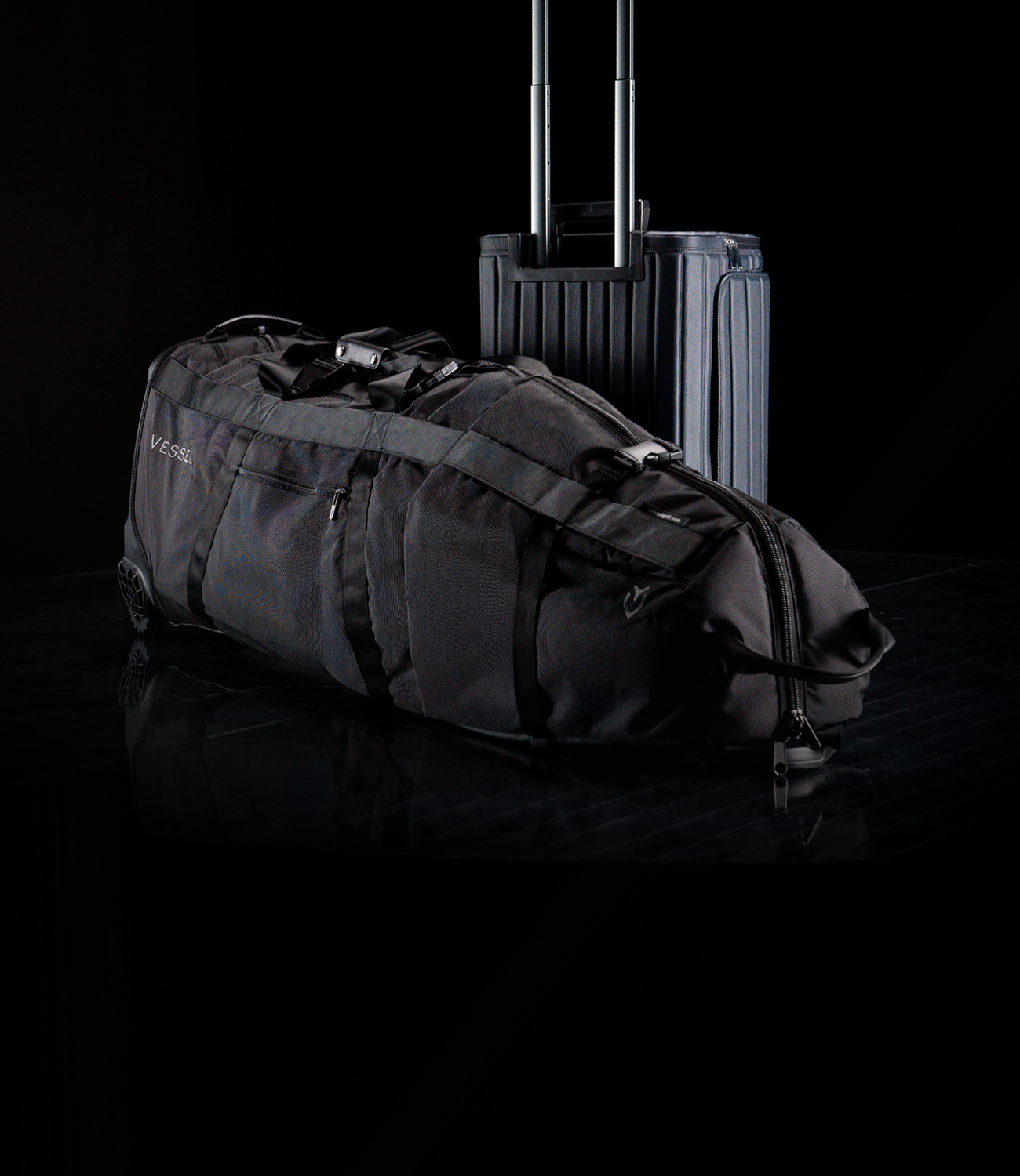 Golf travel bag and suitcase against a black background