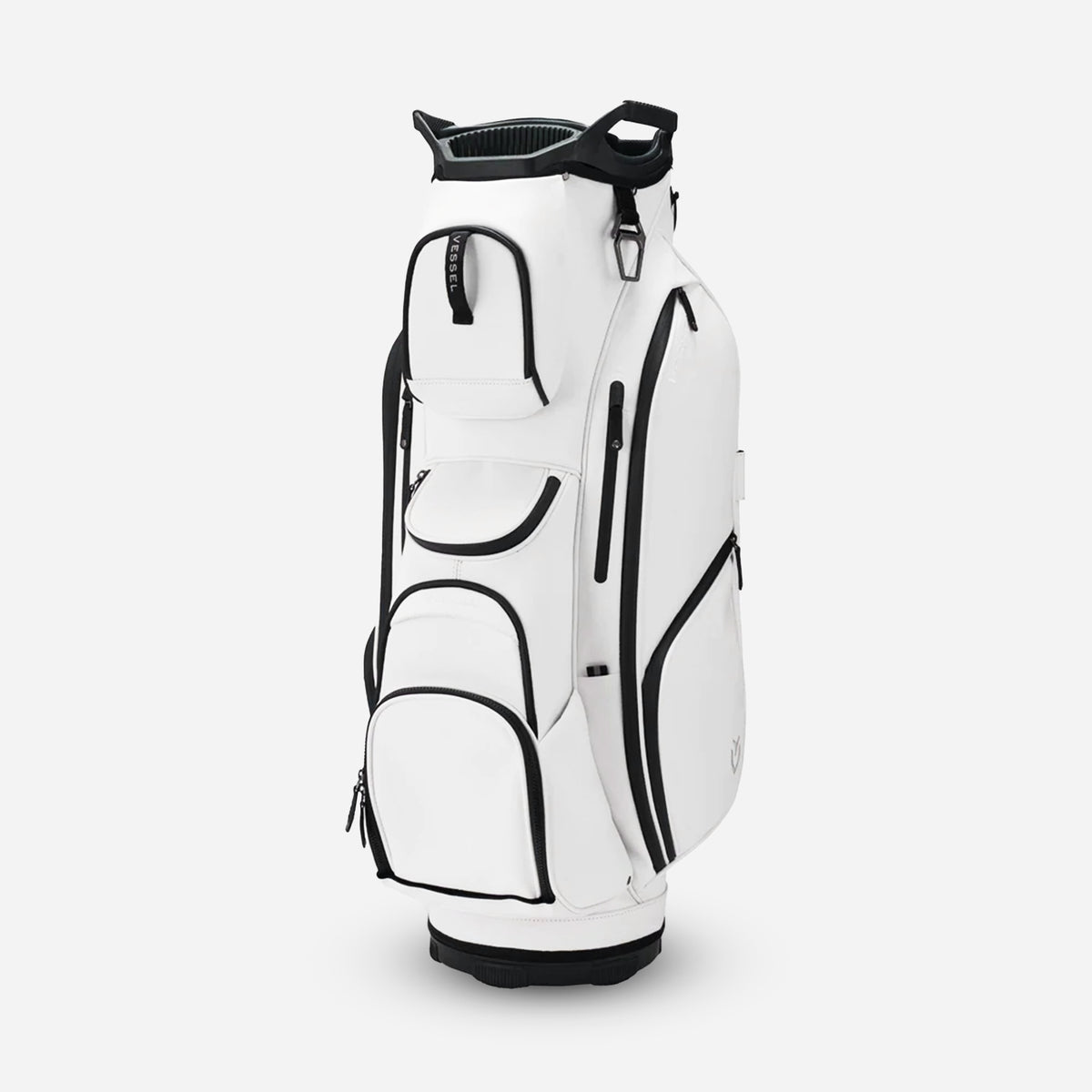 A white golf bag with black accents and multiple pockets, featuring a top handle and a Vessel logo on the front.