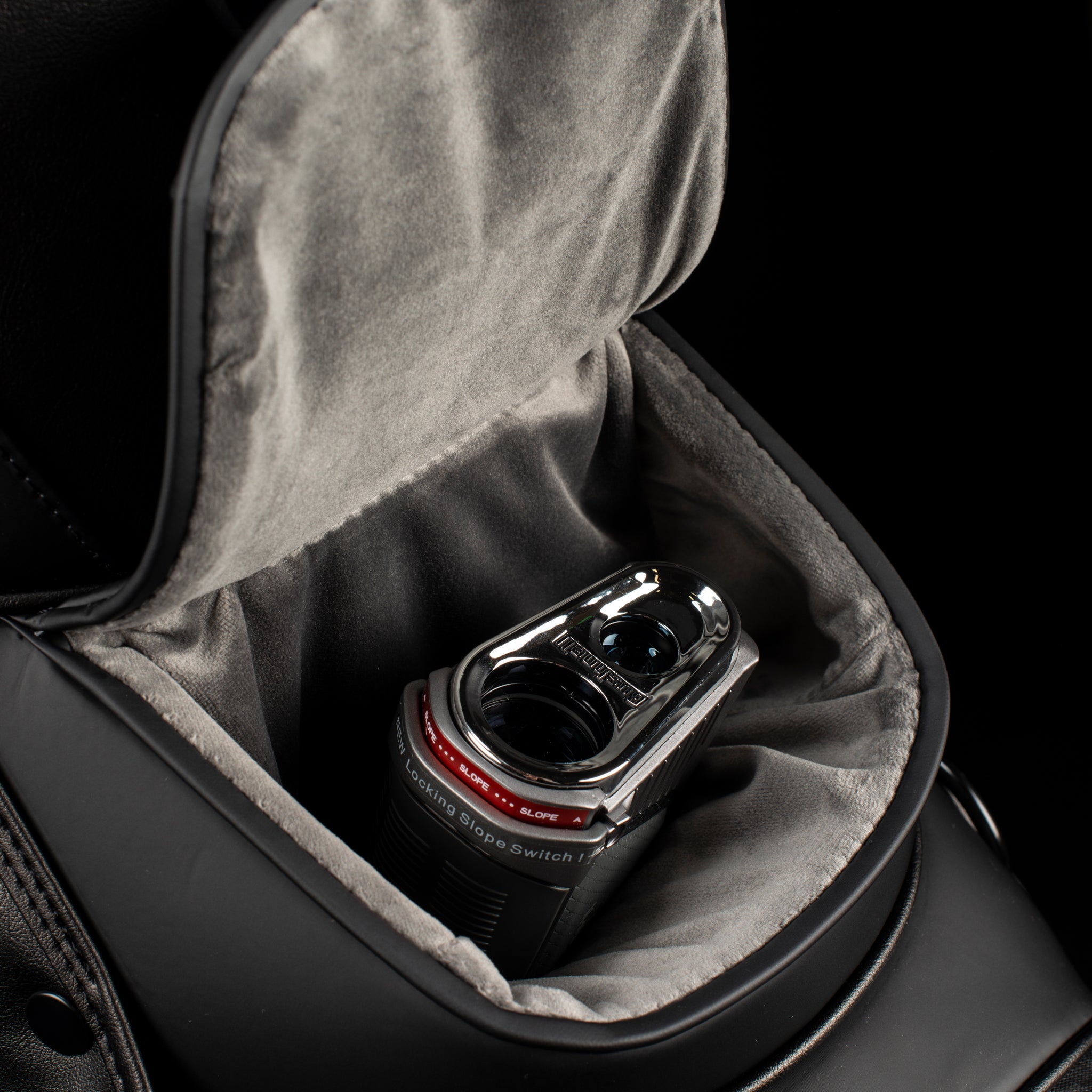 Close up of velour-lined magnetic rangefinder pocket