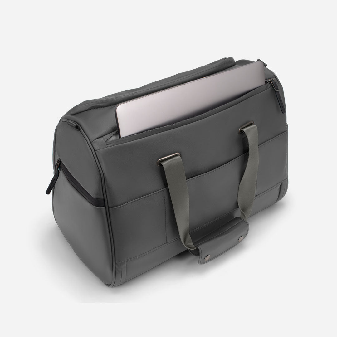 Grey Signature Weekender with laptop inside of sleeve #color_pebbled grey