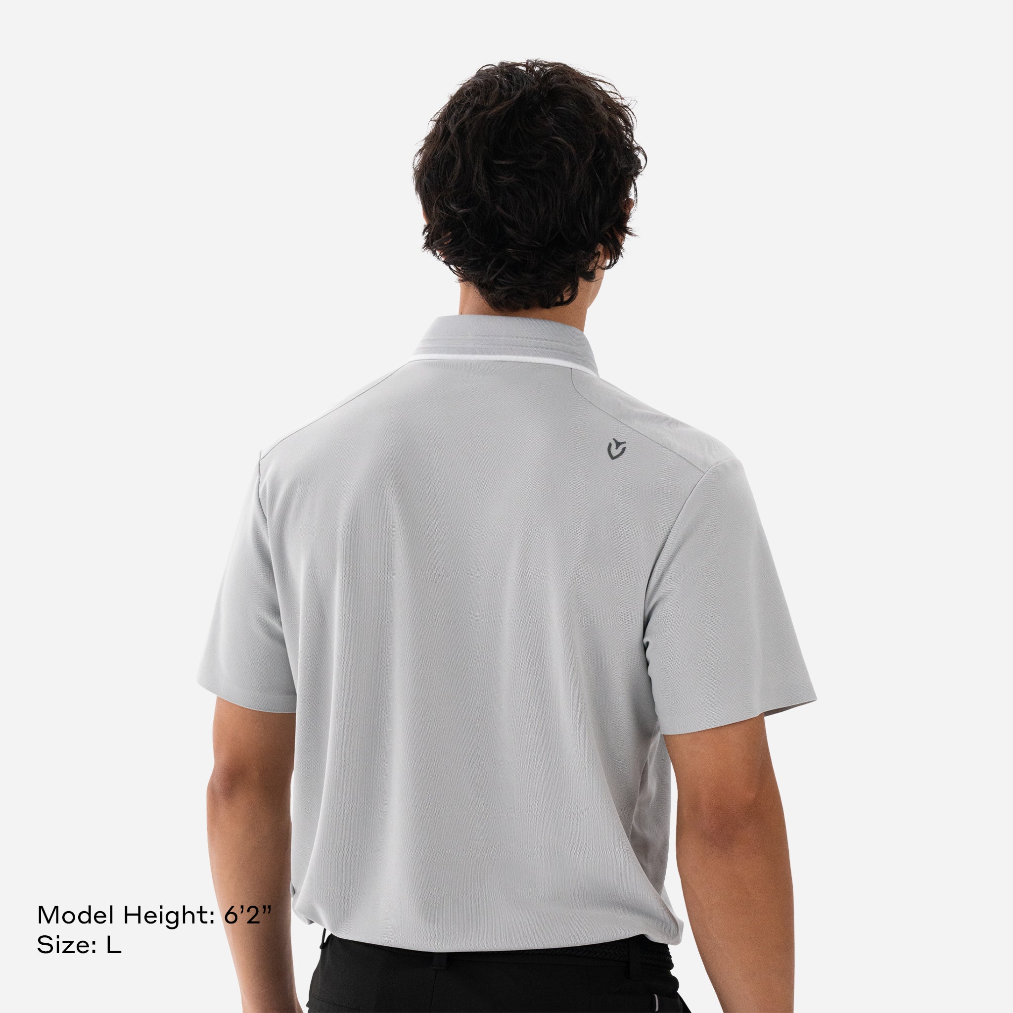Model is 6'2" wearing size L Performance Piqué Polo Grey backside