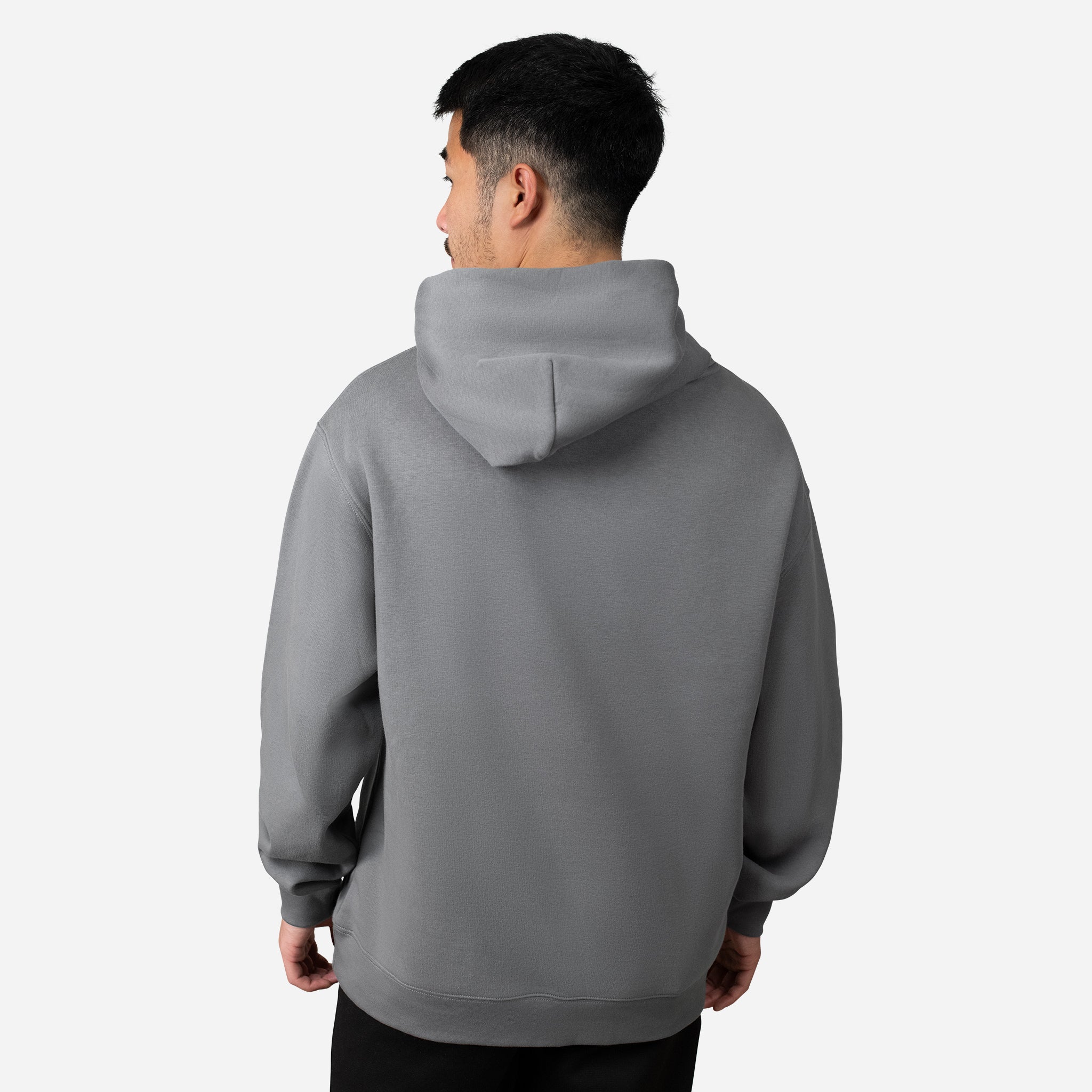 Back of man wearing grey VESSEL Hoodie #color_grey