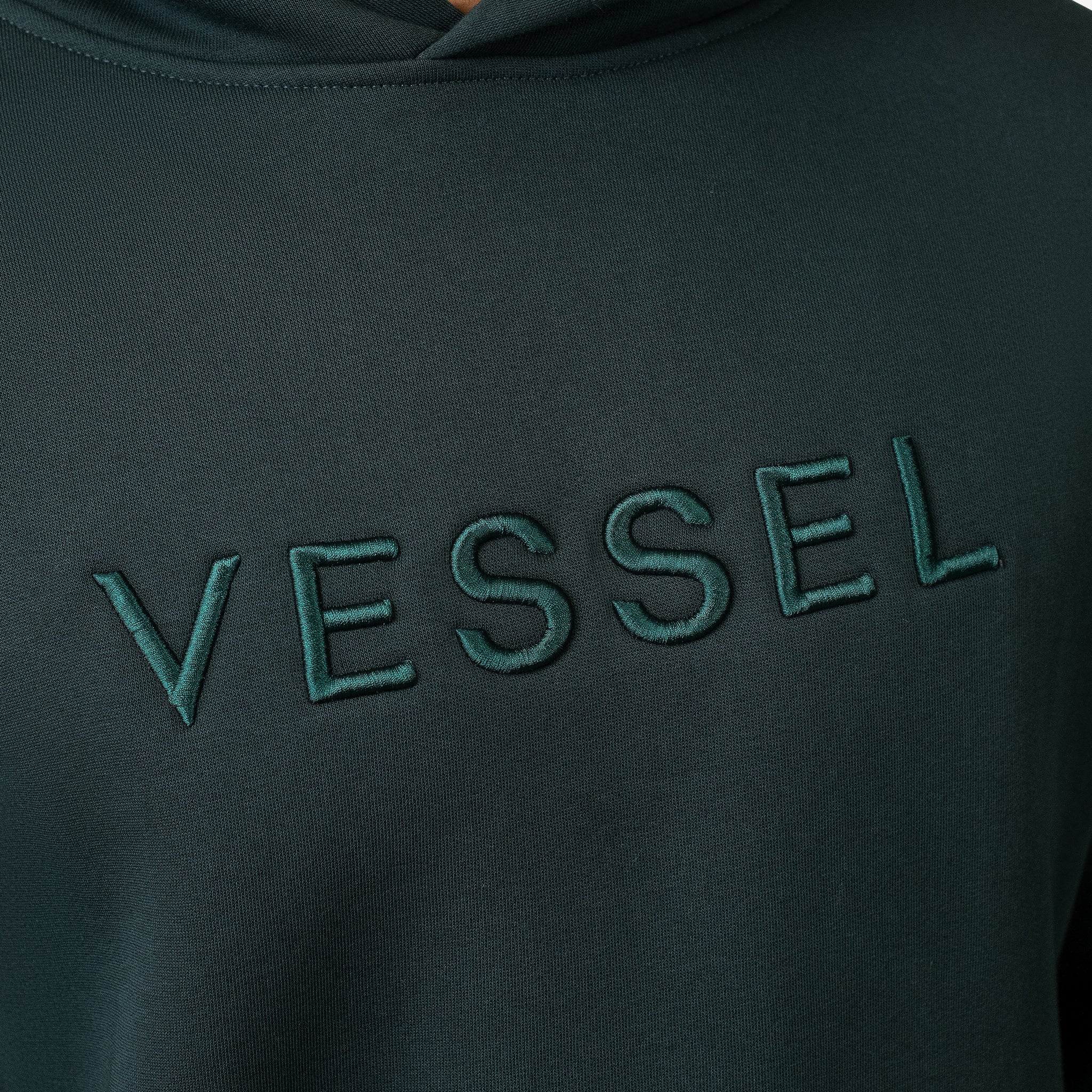 Embroidered logo on green VESSEL Hoodie #color_green