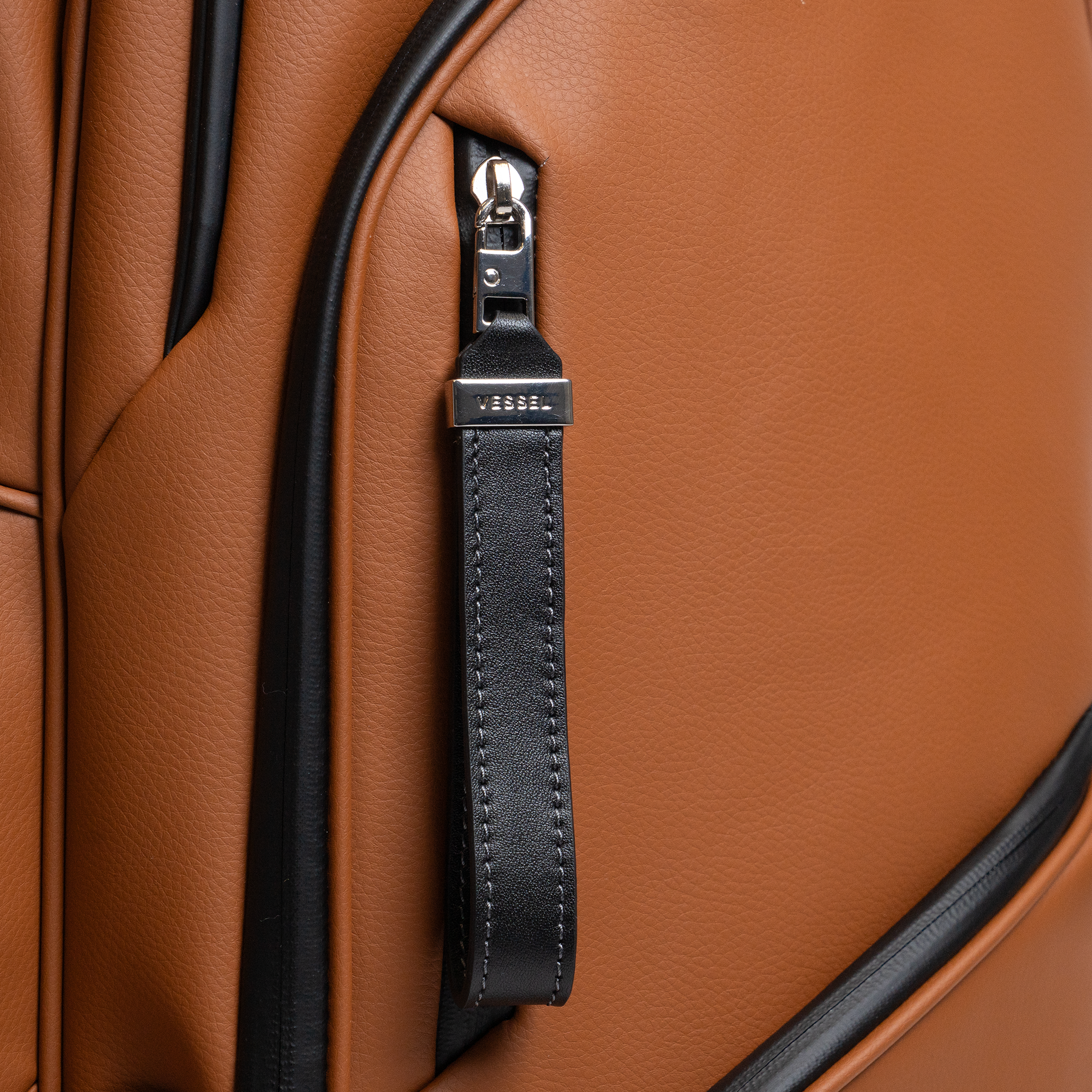 Close up of waterproof zippers on Lux pro cart II Heritage Brown