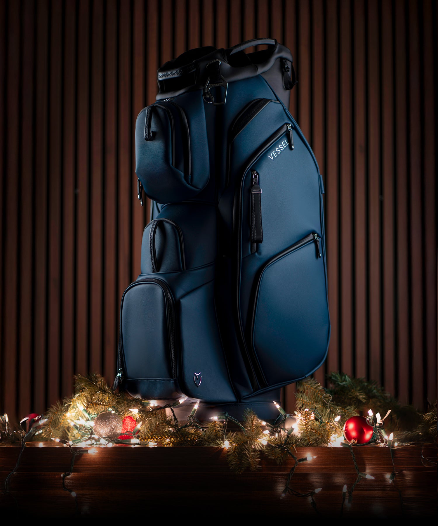 Navy Lux Pro Cart II sitting on Christmas lights