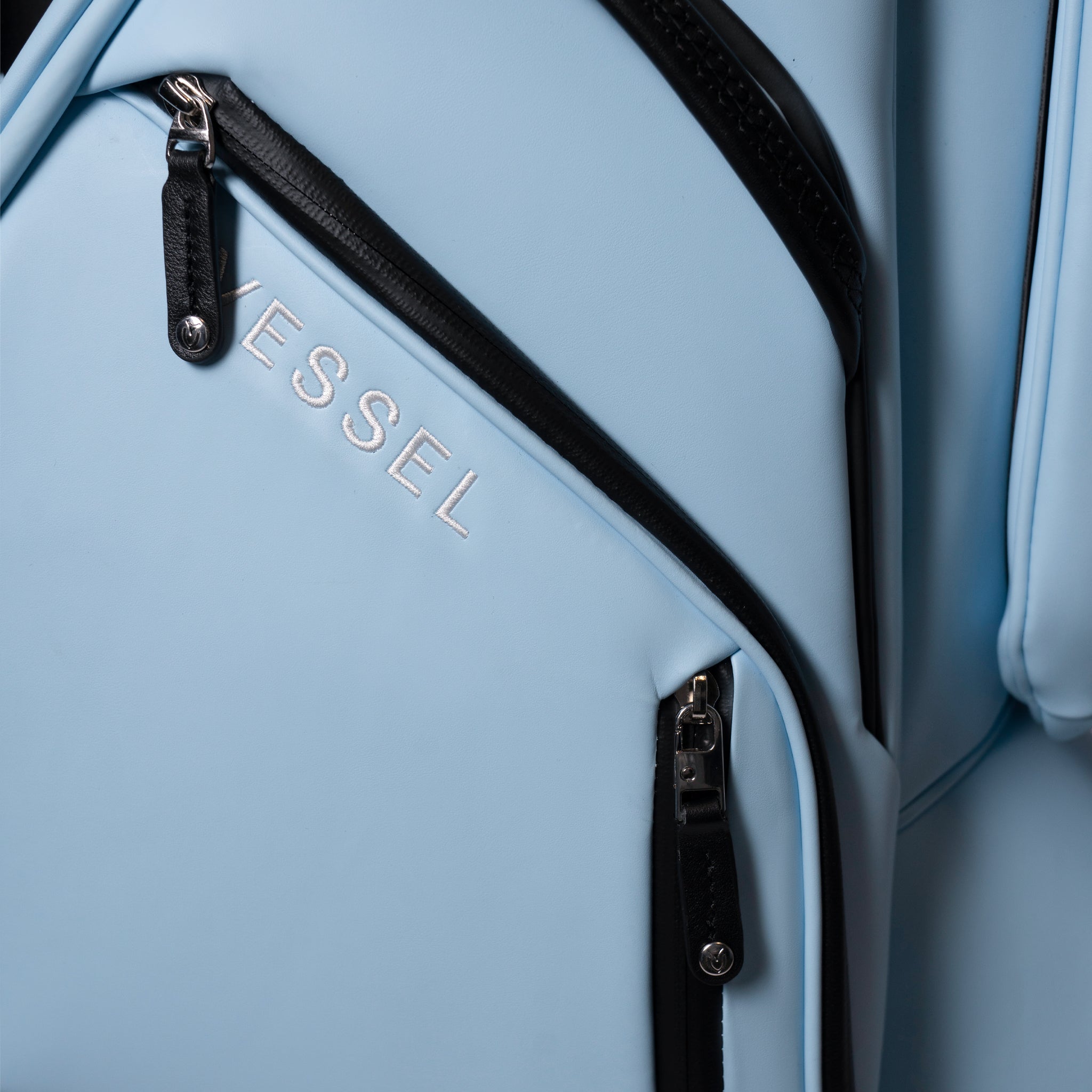 Close up of zippers on Lux Pro Cart II golf bag