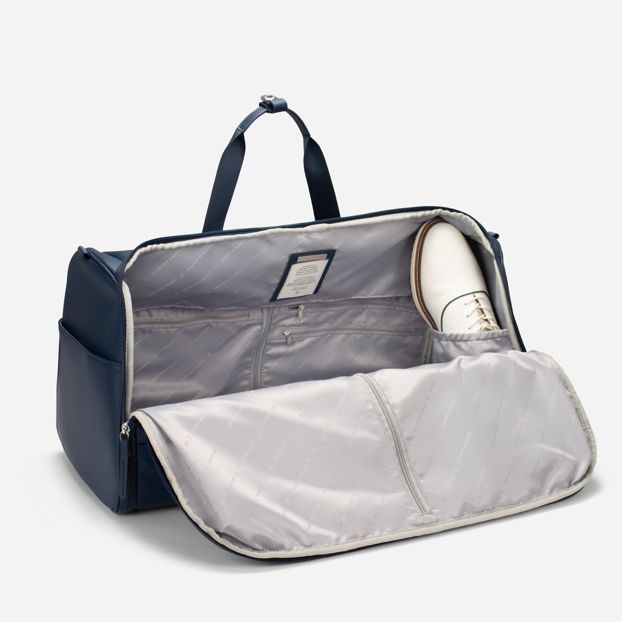 Navy Signature Garment Duffel open with shoe inside #color_Pebbled Navy