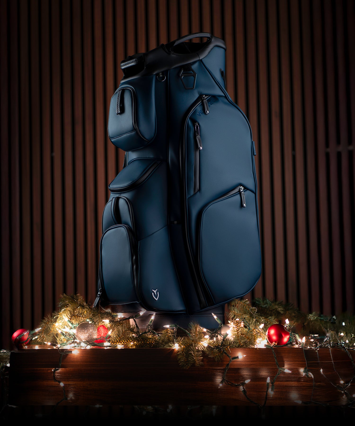 Navy Lux Pro Cart sitting on Christmas lights