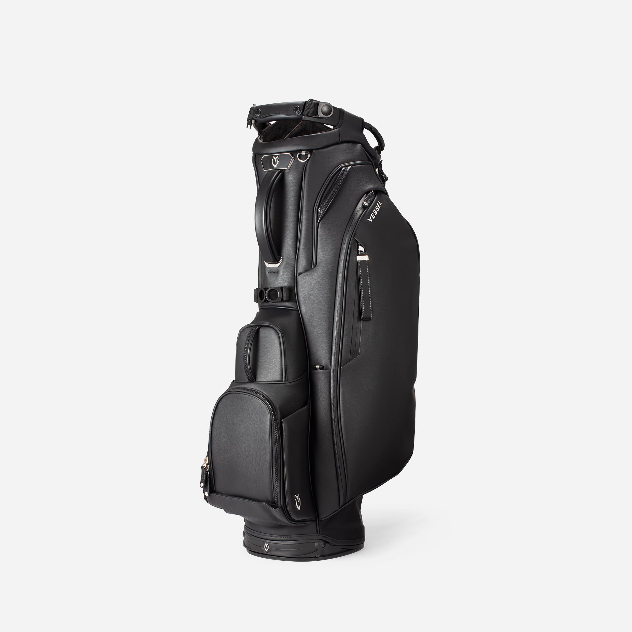 Black golf bag standing vertical on white background