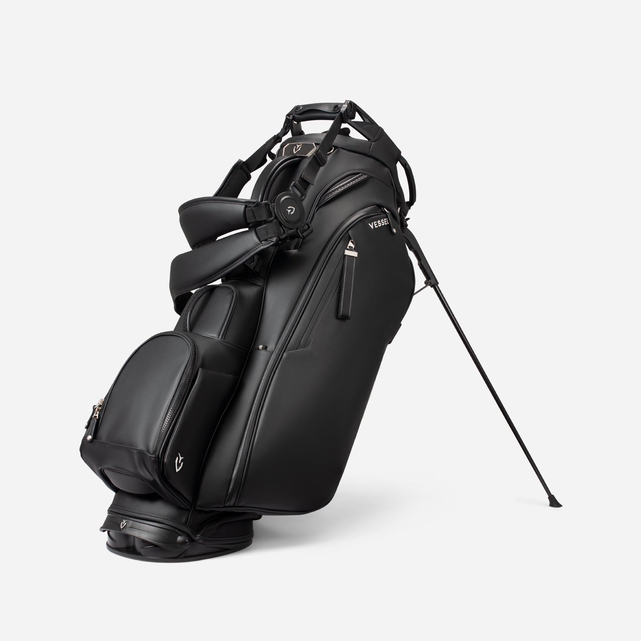 Black golf bag on white background, with double strap option attatched