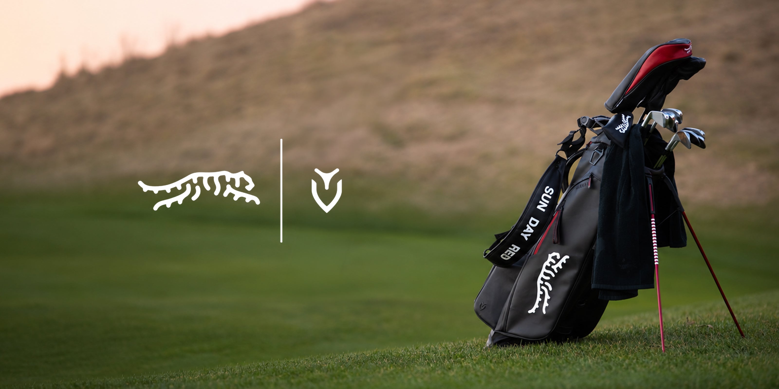A Sun Day Red golg bag on a golf course with VESSEL logo