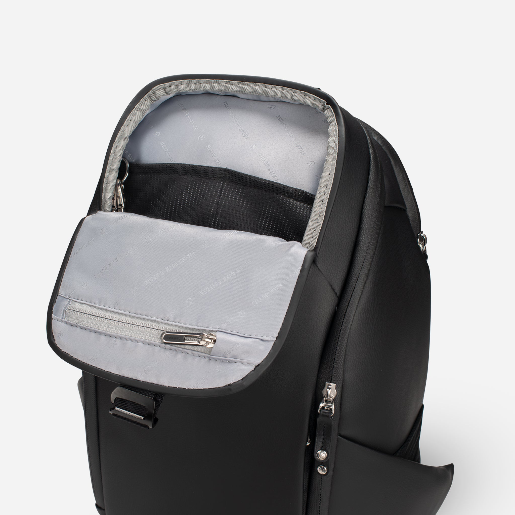 Top magnetic pocket of Pebbled black PrimeX Backpack opened #color_pebbled black