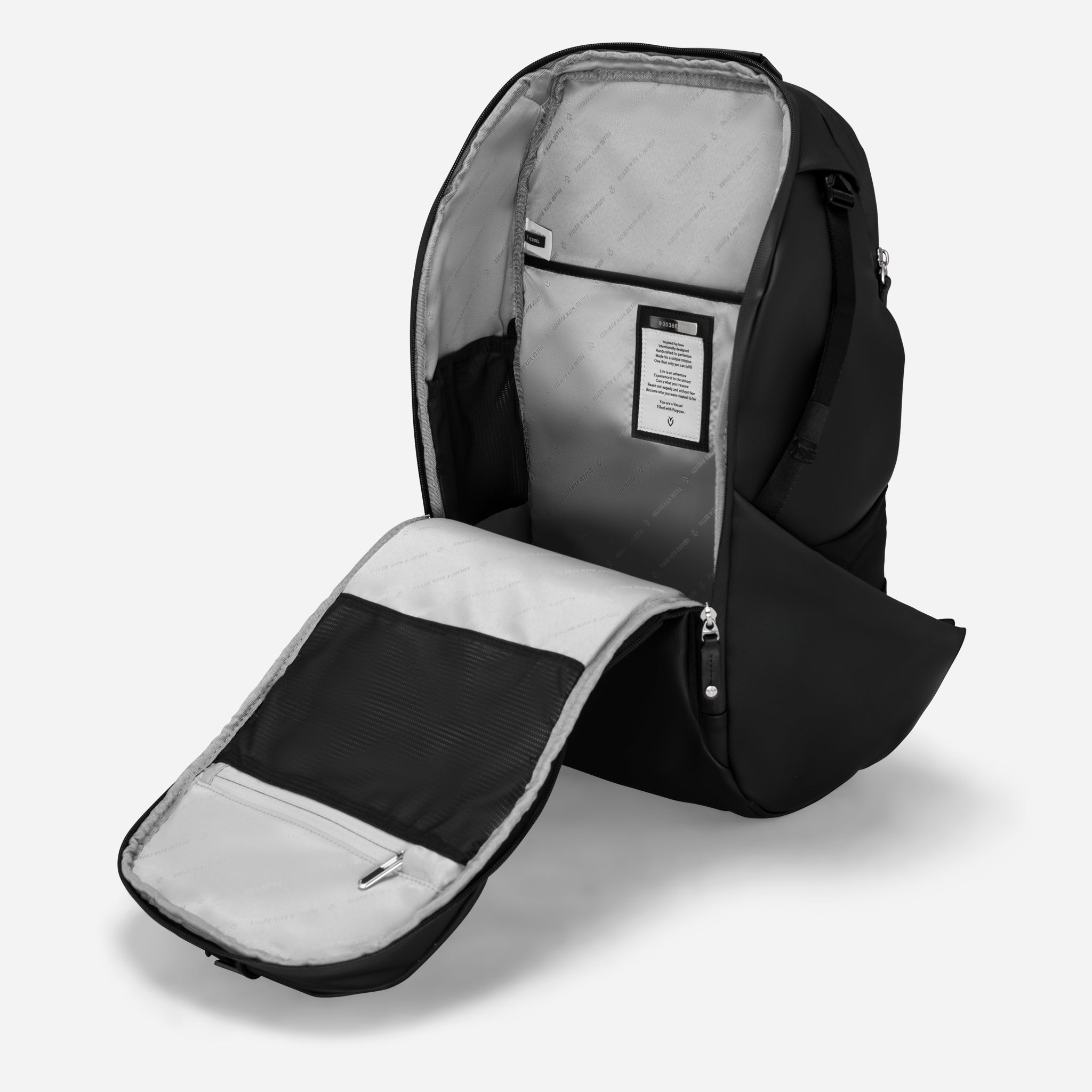 Main compartment of Pebbled Black PrimeX Plus Backpack opened #color_pebbled black
