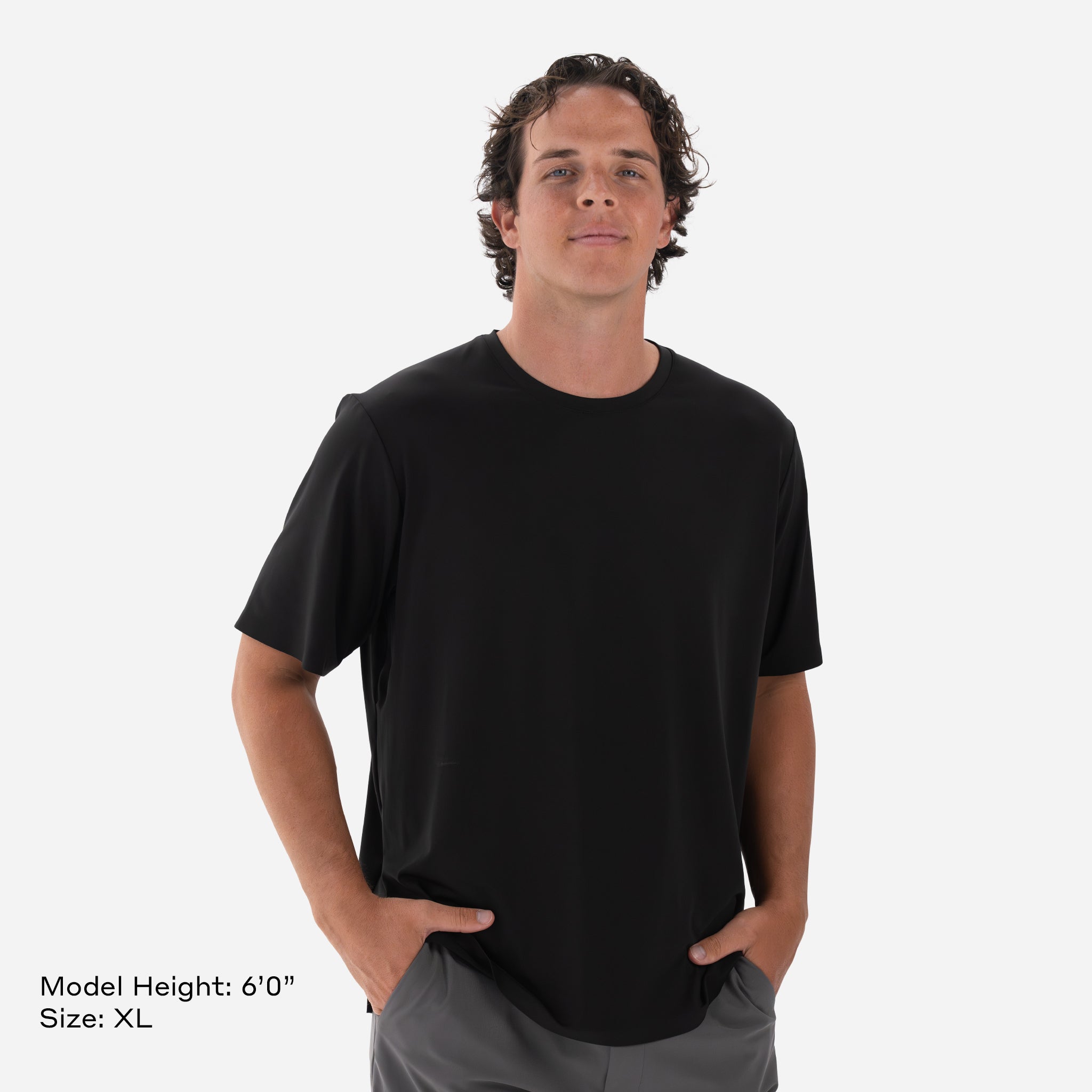 Model is 6'0" Wearing Size XL Performance Tech Tee Black