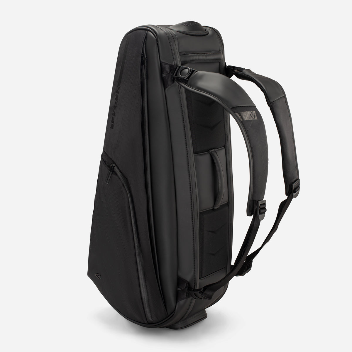 Baseline 2.0 DXR Racquet Bag standing with backpack straps attached