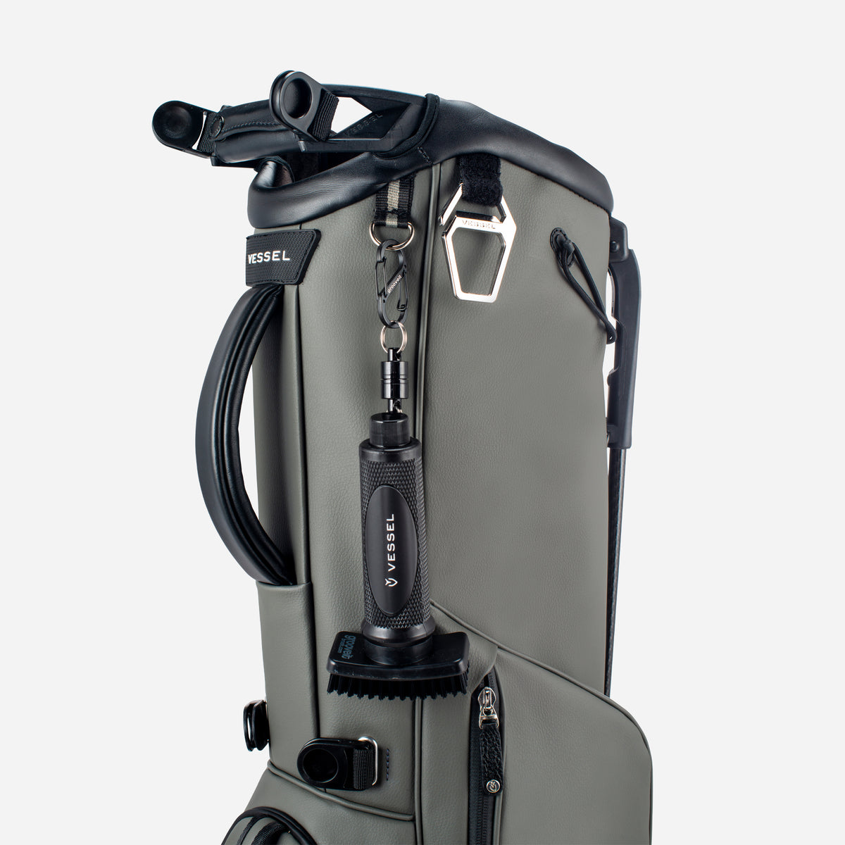 VESSEL x GrooveIt Brush on carabiner on VESSEL stand bag