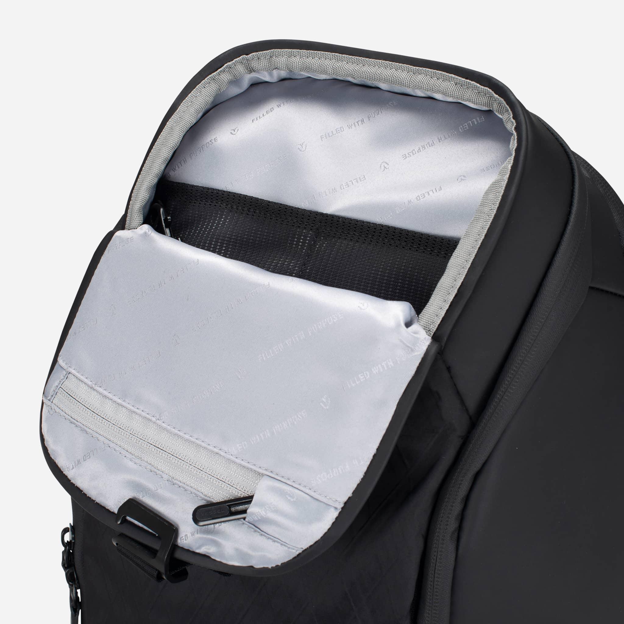 Upper magnetic pocket of PrimeX DXR Backpack opened #color_dxr black