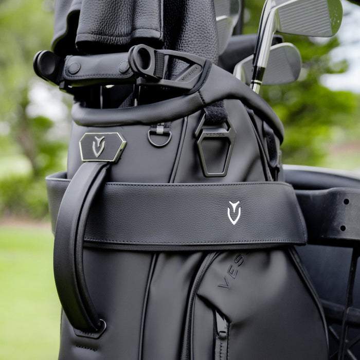 a golf bag featuring a cart strap sleeve