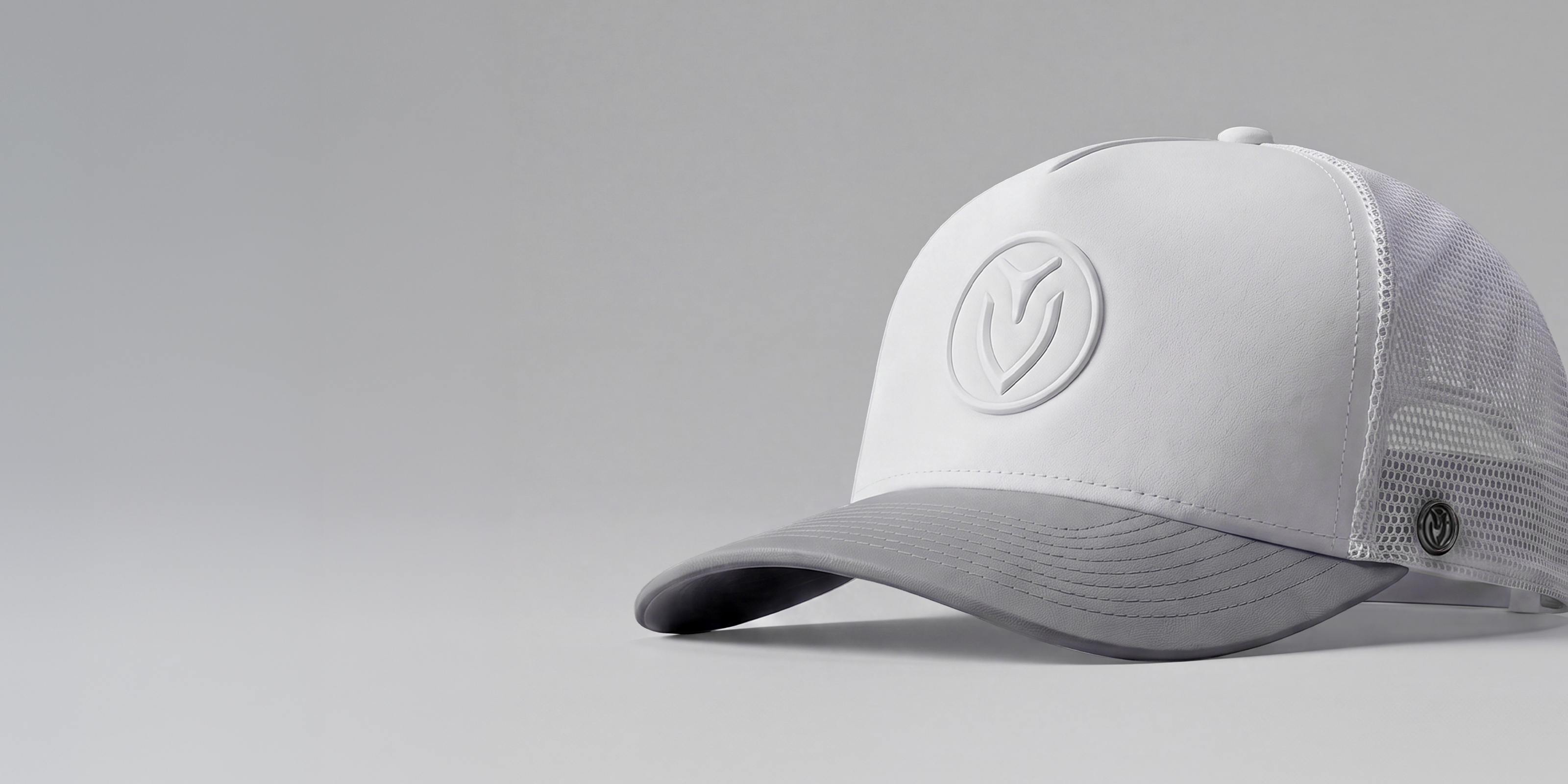 White and grey tour performance mesh hat on a grey gradient background