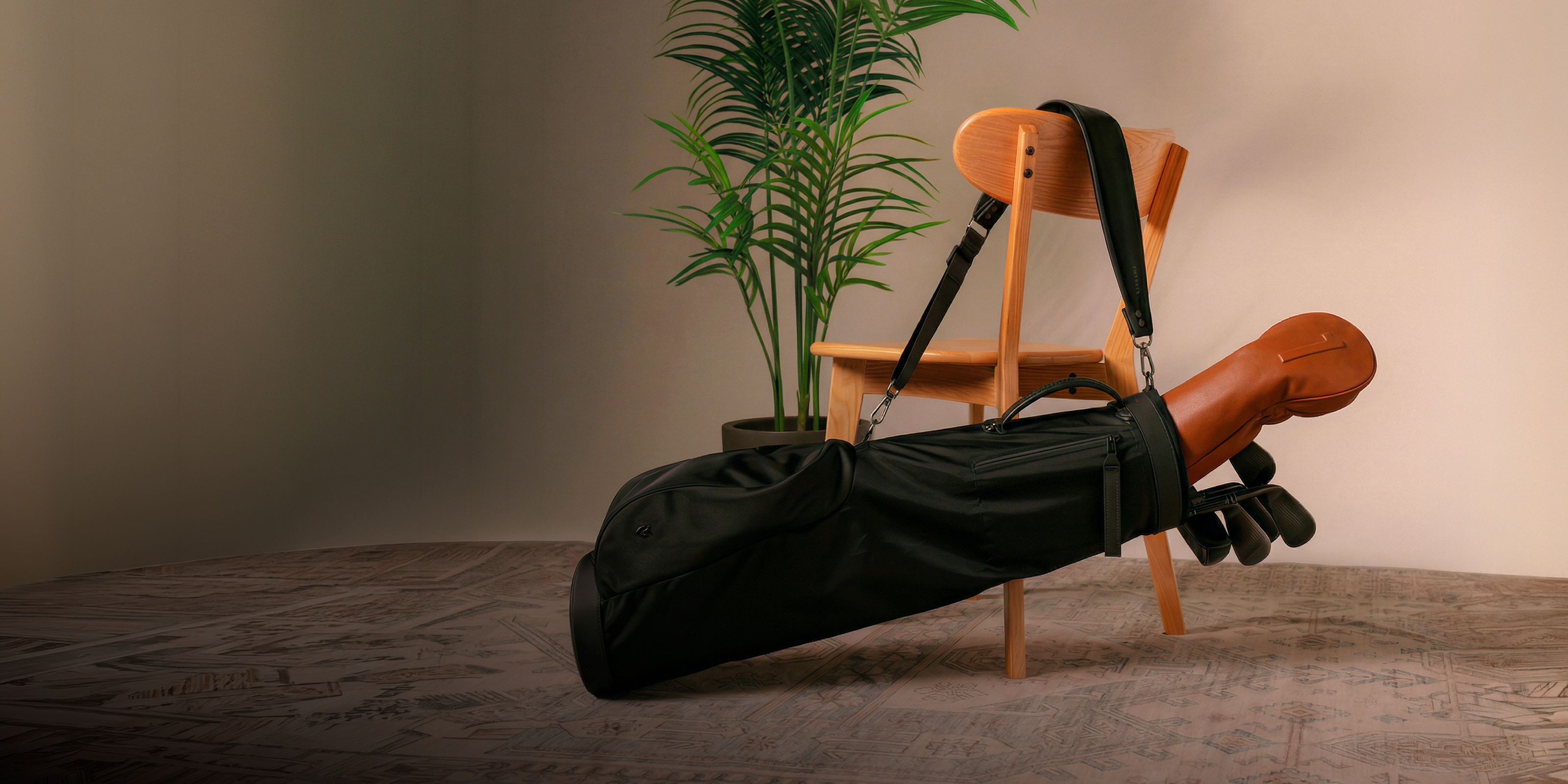 Sunday carry golf bag hanging on a chair