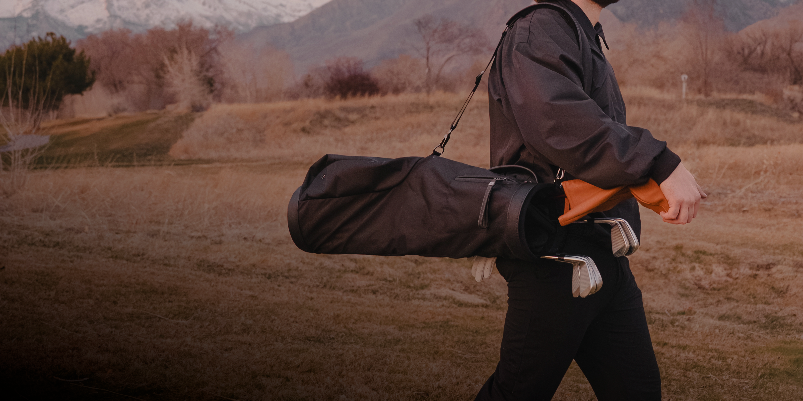 Man walking with Sunday Carry Golf Bag