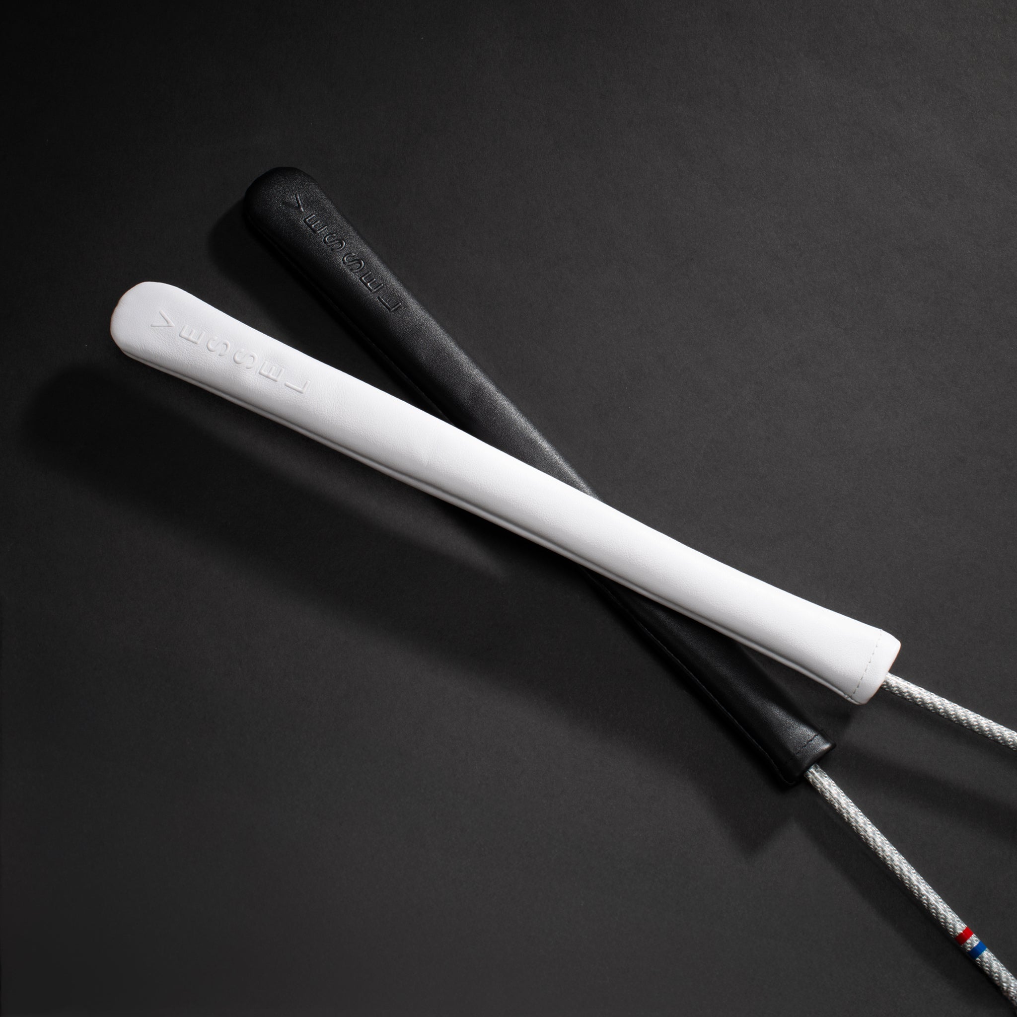 Black and White Alignment Stick Embossé Covers on alignment sticks