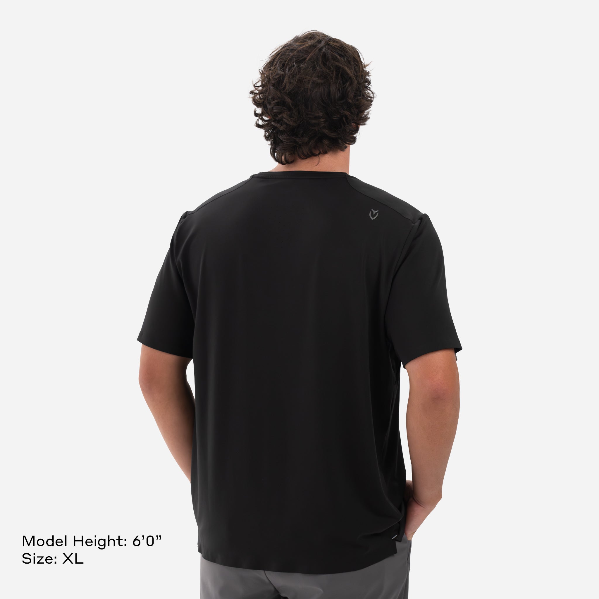 Model is 6'0" Wearing Size XL Performance Tech Tee Black backside