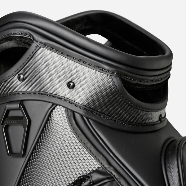 Close up detail image of top of black carbon fiber PrimeX Tour staff bag