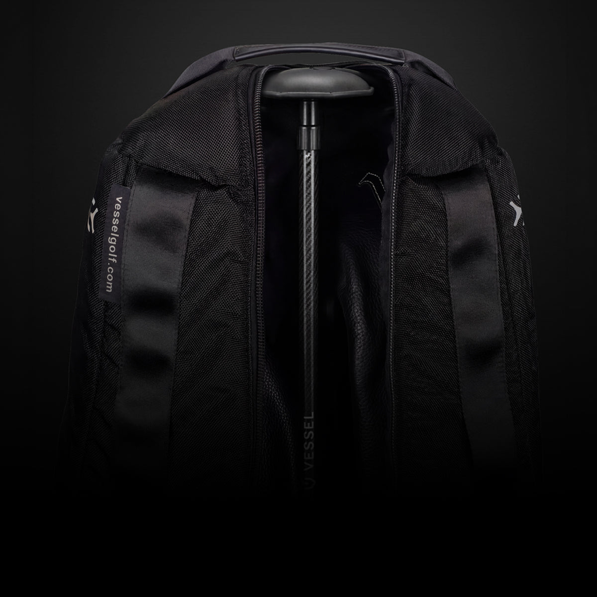 Travel club protector inside of travel case on black background