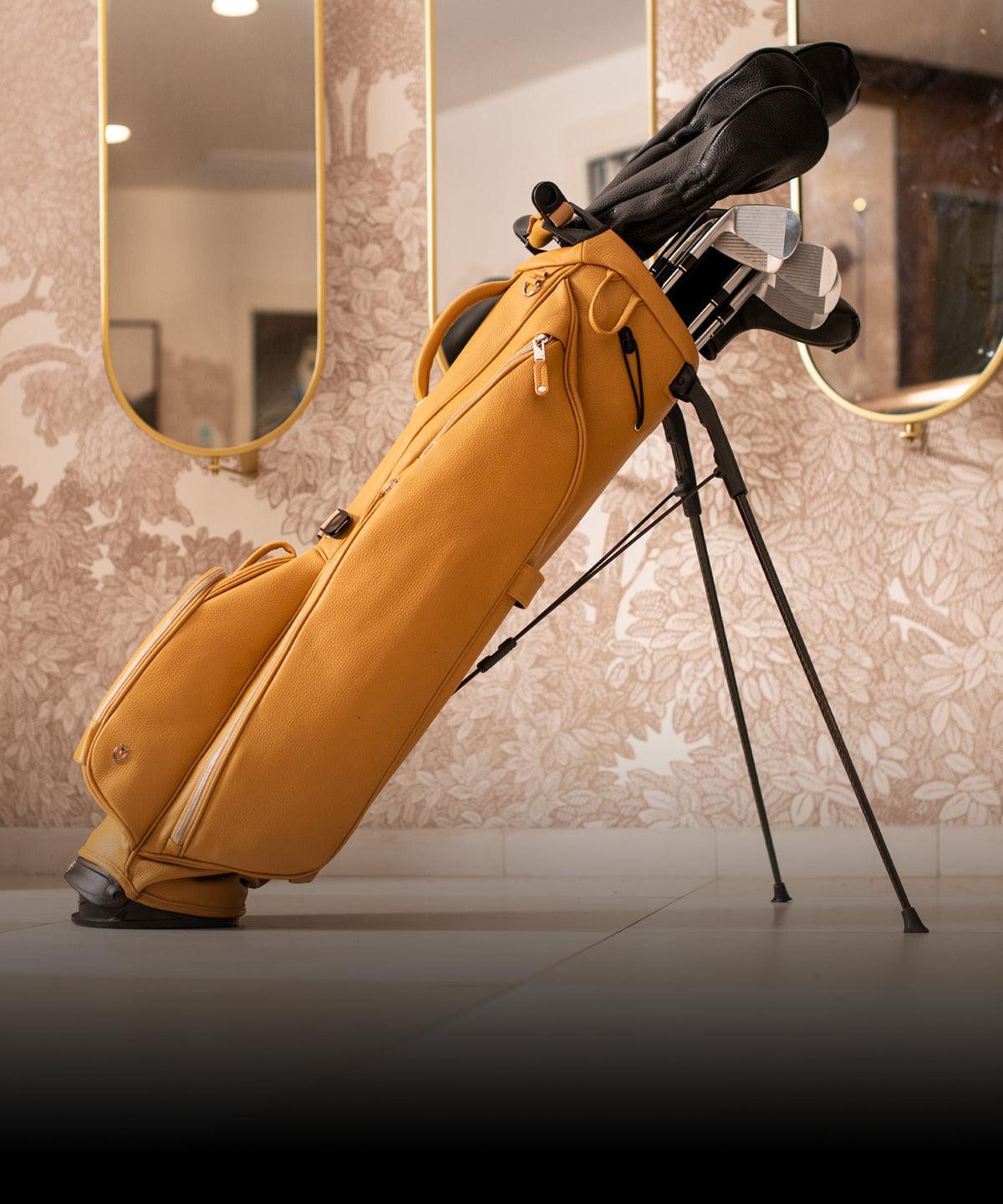 A genuine leather sunday 3 stand bag with golf club in black leather golf headcovers