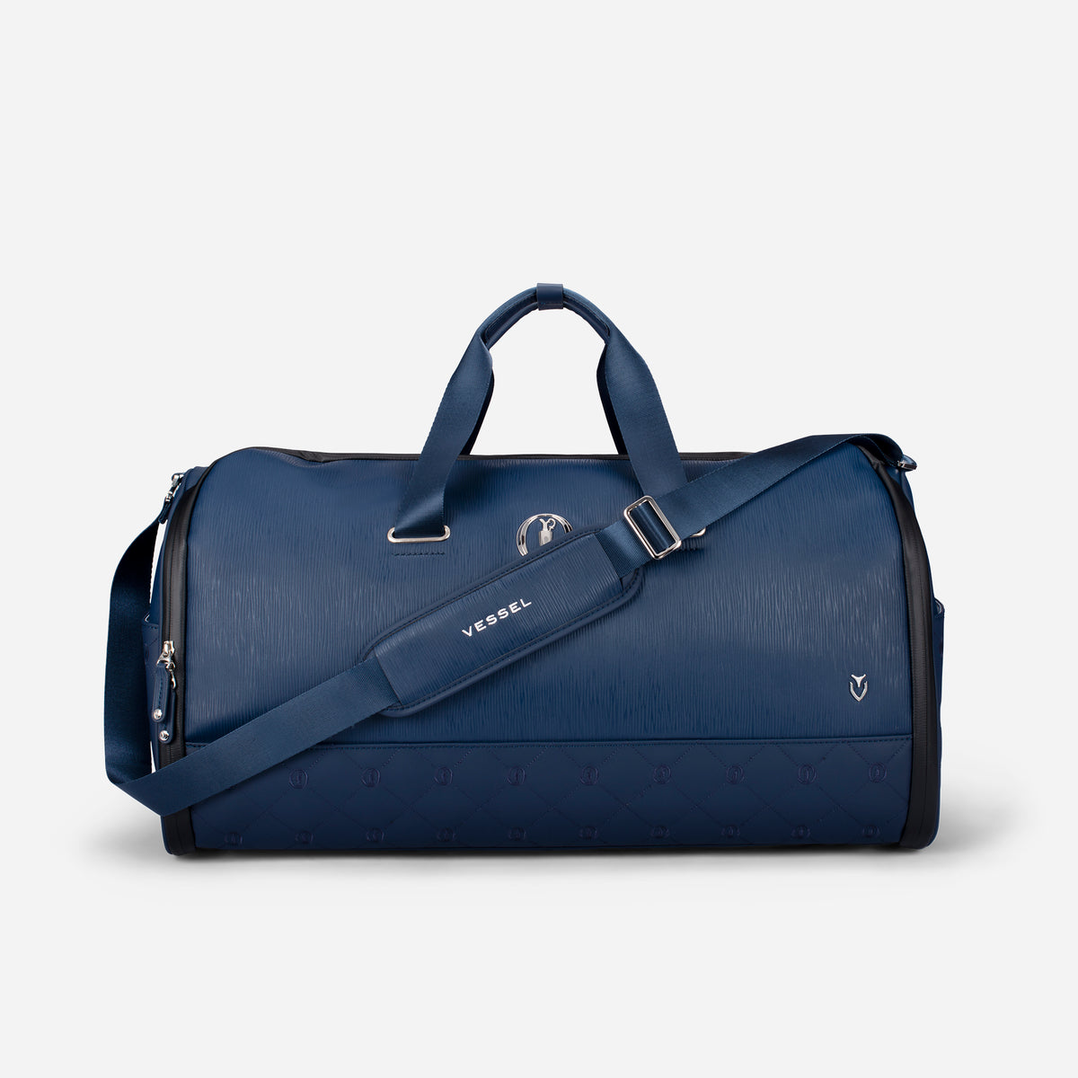 The Open x VESSEL Signature Garment Duffel with strap attached