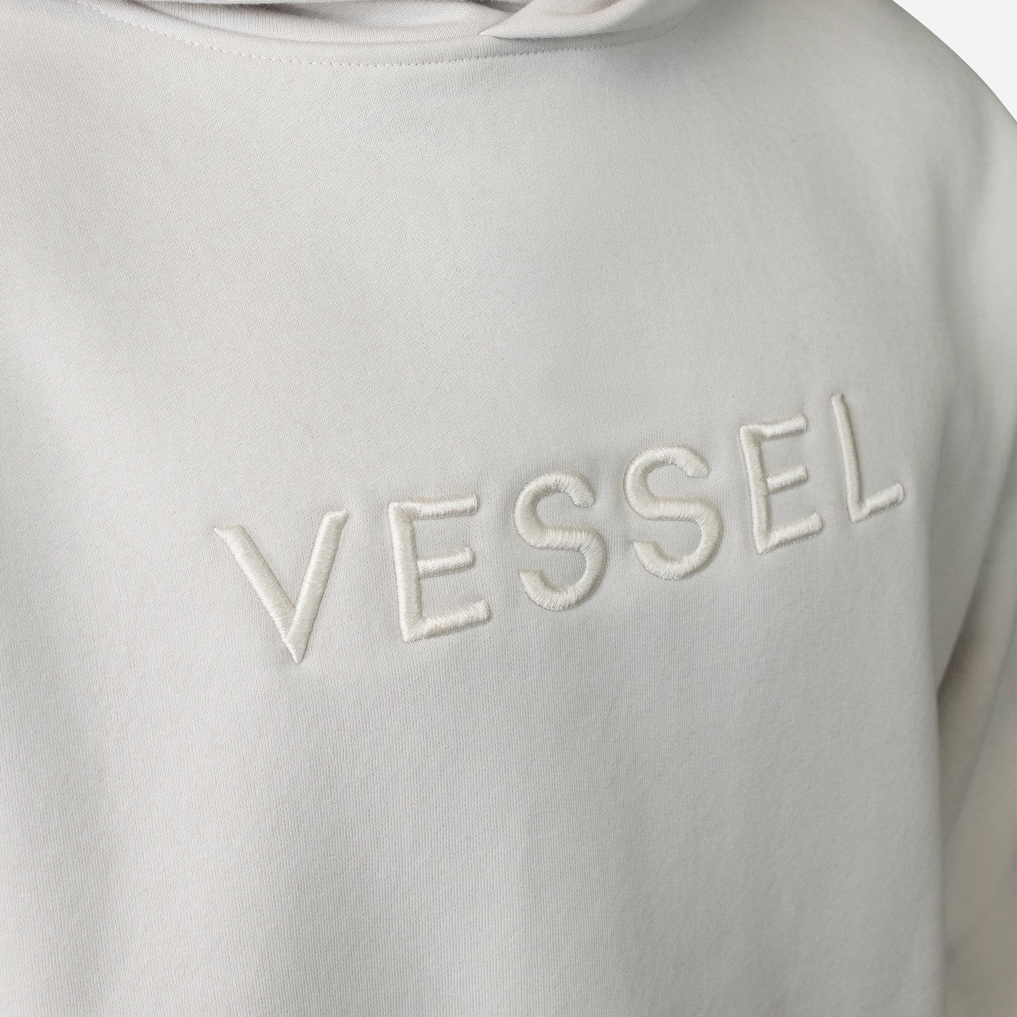 Embroidered logo on cream VESSEL Hoodie #color_cream