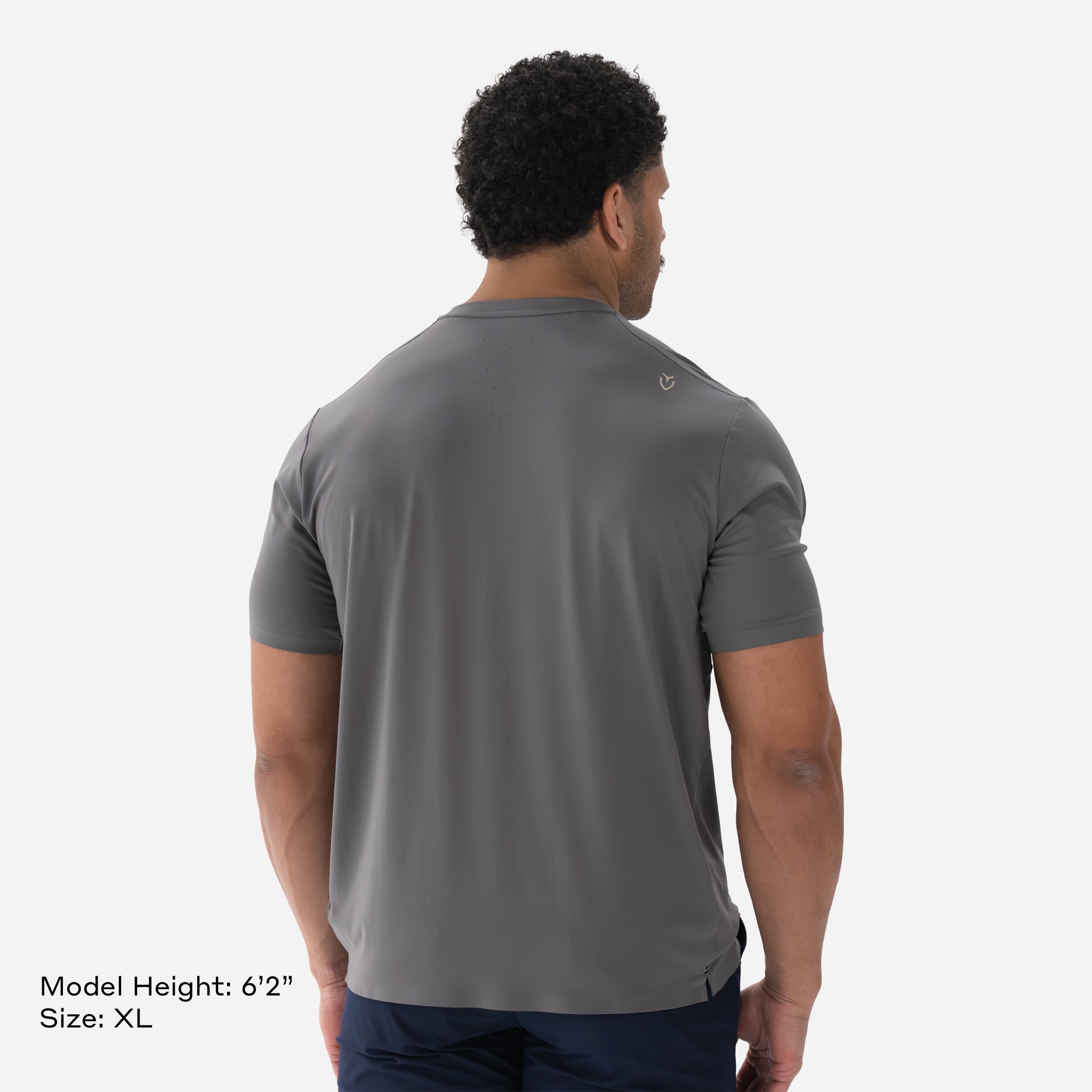 Model is 6'2" Wearing Size XL Performance Tech Tee Grey backside