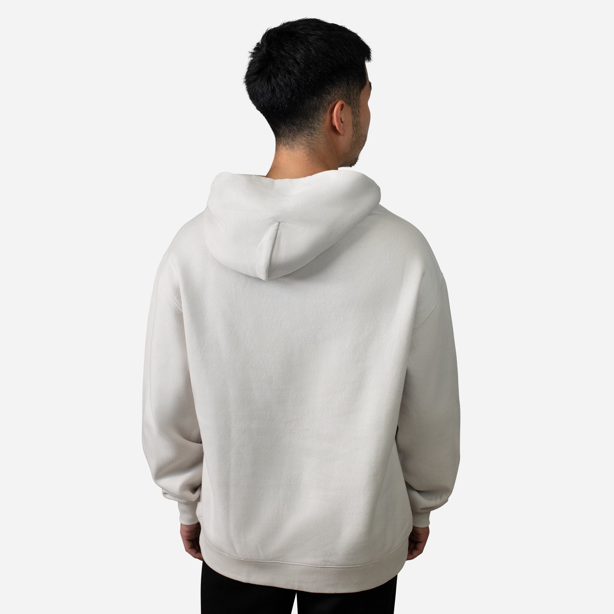 Back of man wearing cream VESSEL Hoodie #color_cream