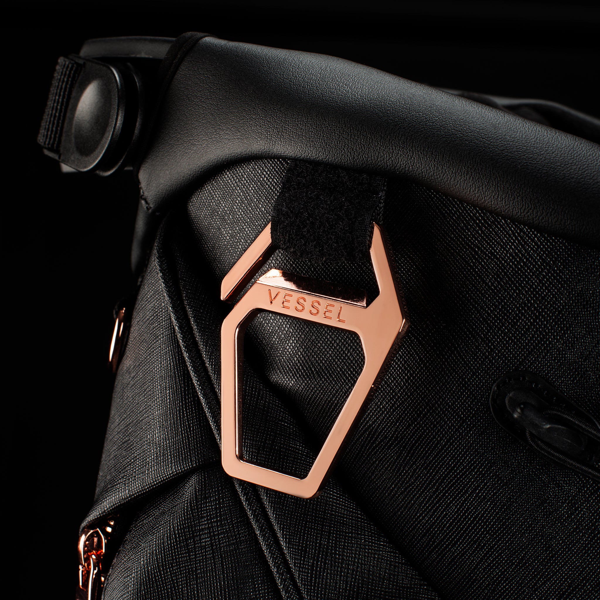 Close up of rose gold g hook on Lux Carbon LE Midnight Rose Stand