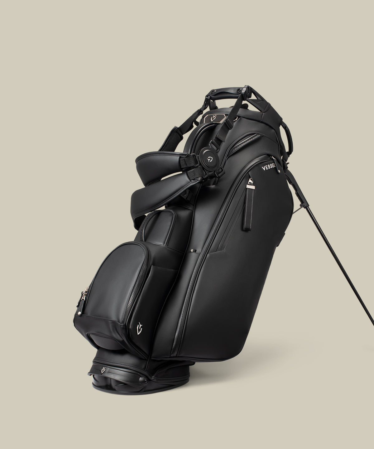 Black Player V Pro stand bag on a taupe background