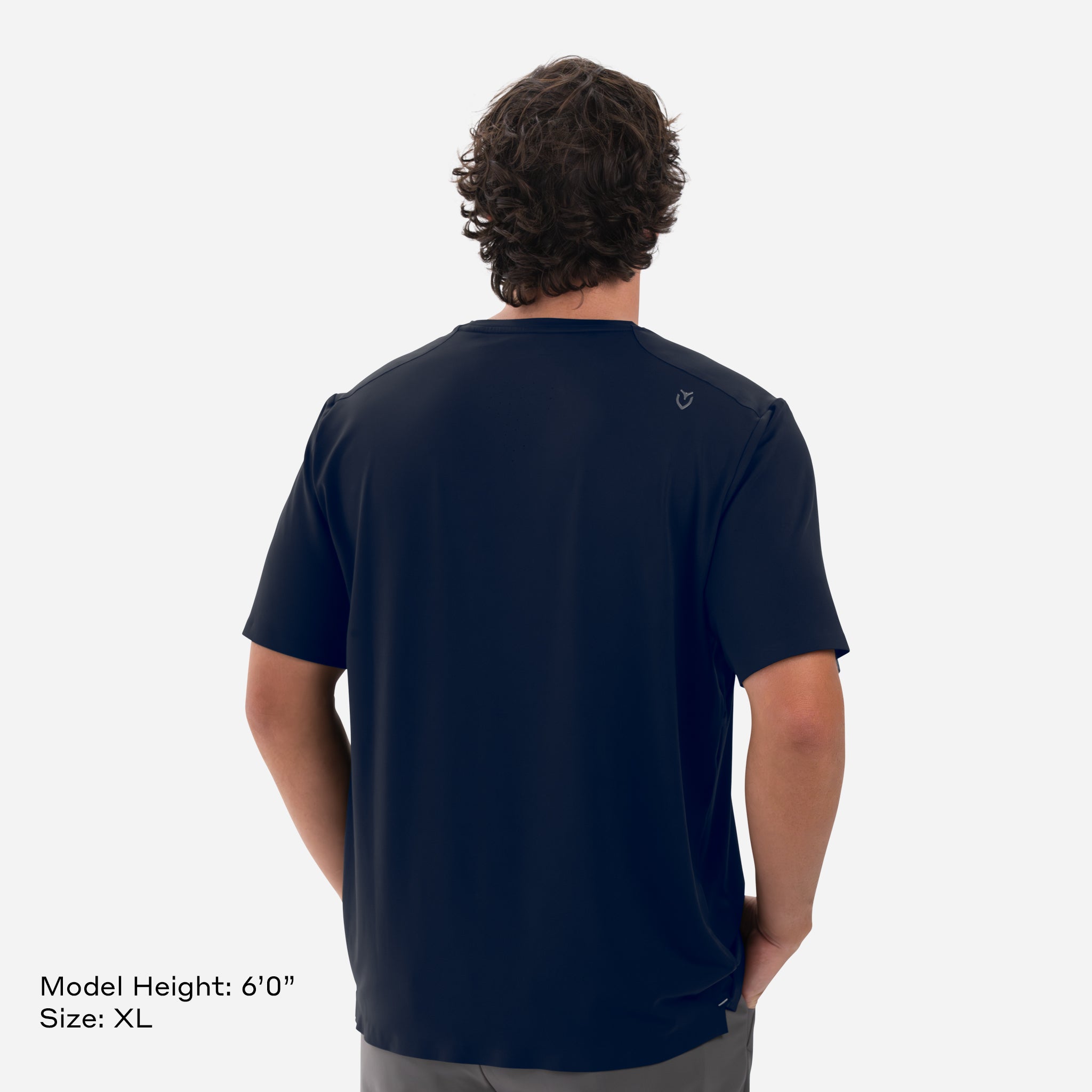 Model is 6'0" Wearing Size XL Performance Tech Tee Navy backside