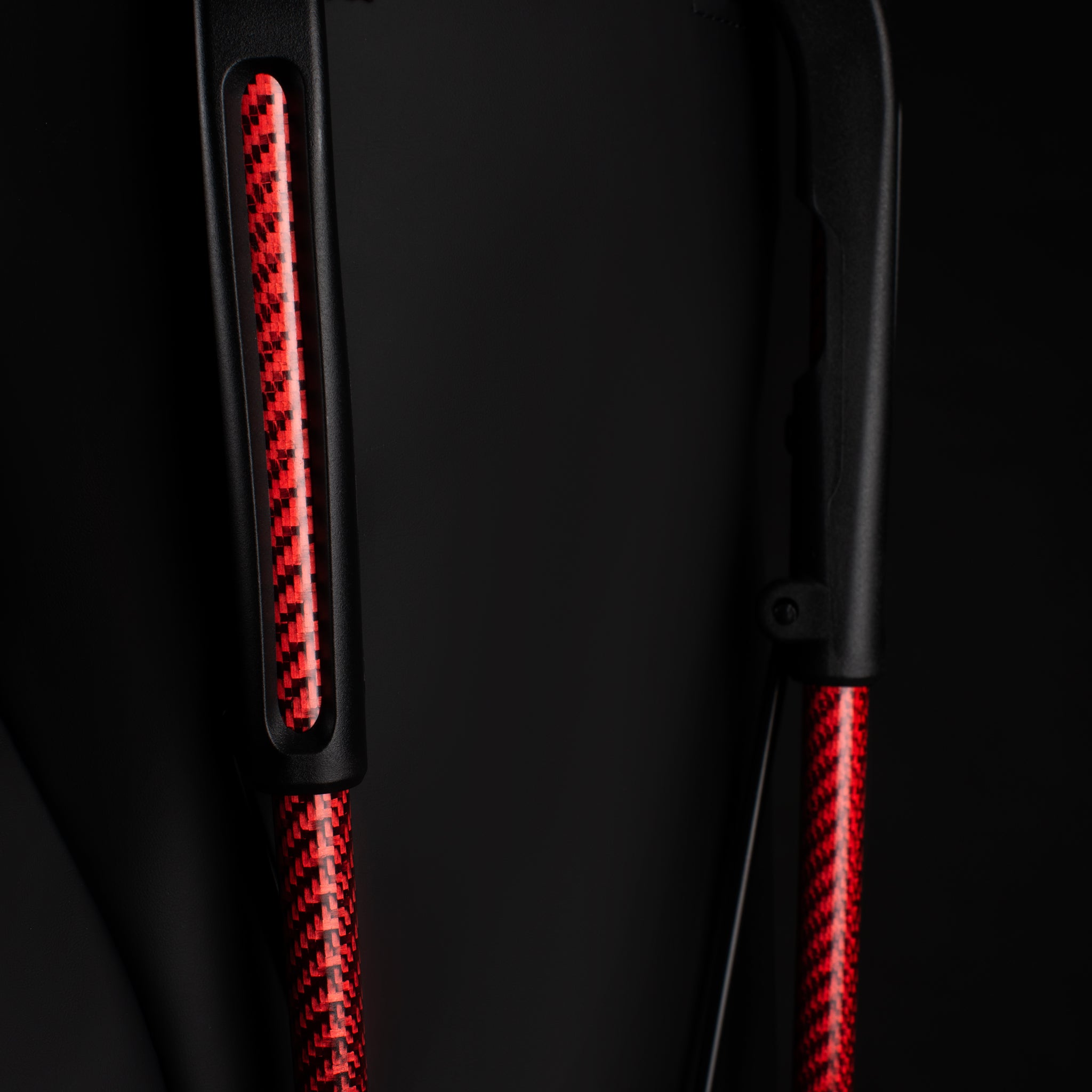 close up of red carbon fiber legs on nightfire player v pro golf bag