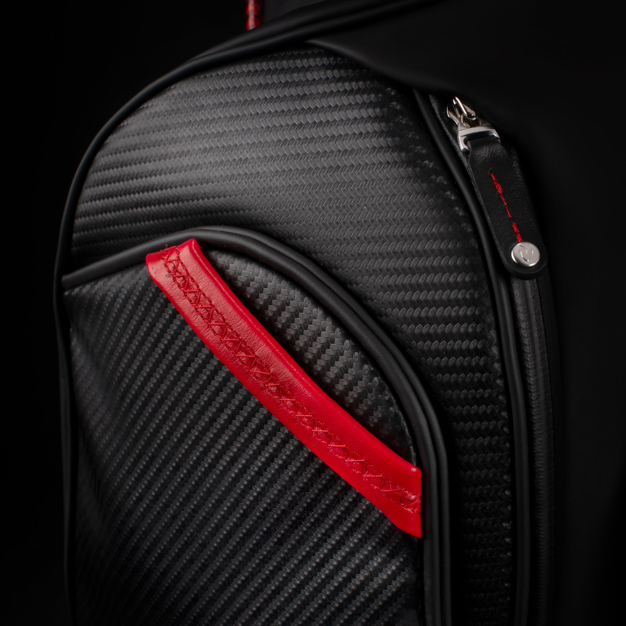 Close up of red leather handles on nightfire player v pro golf bag