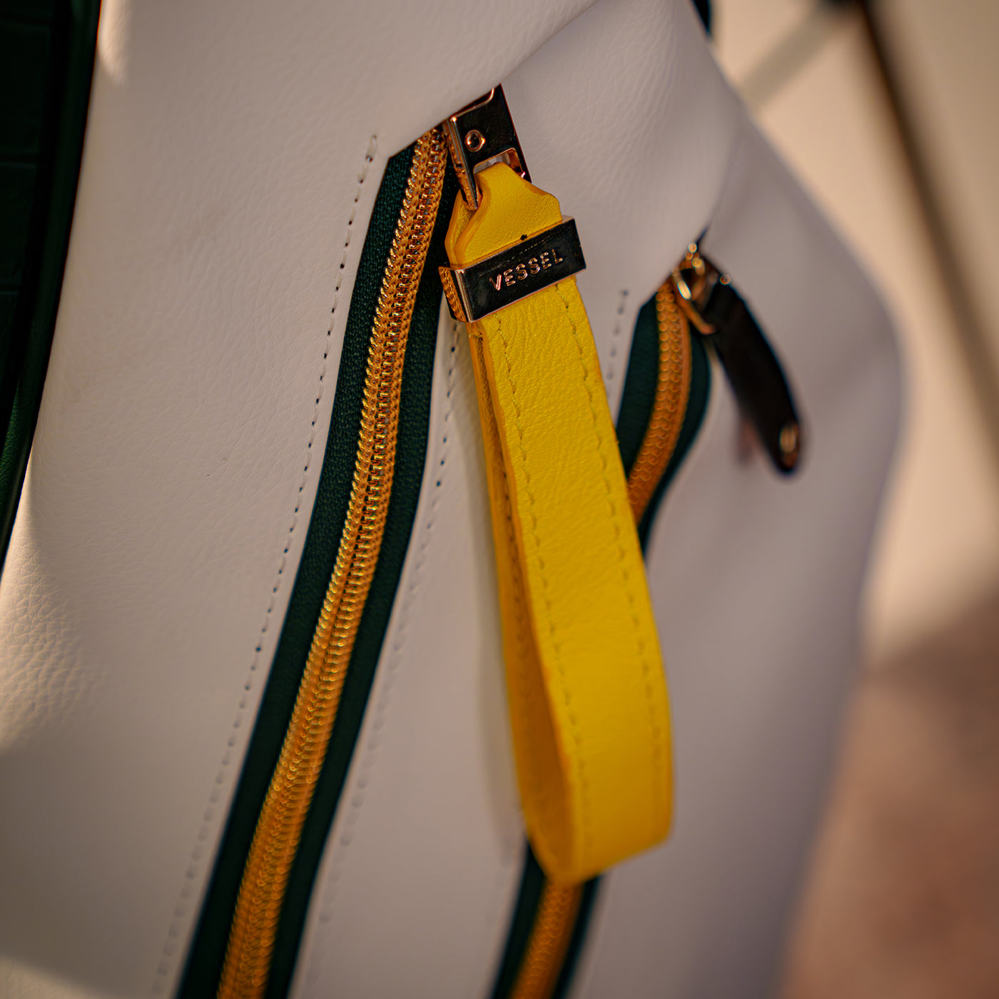 leather zipper pull on leather golf bag