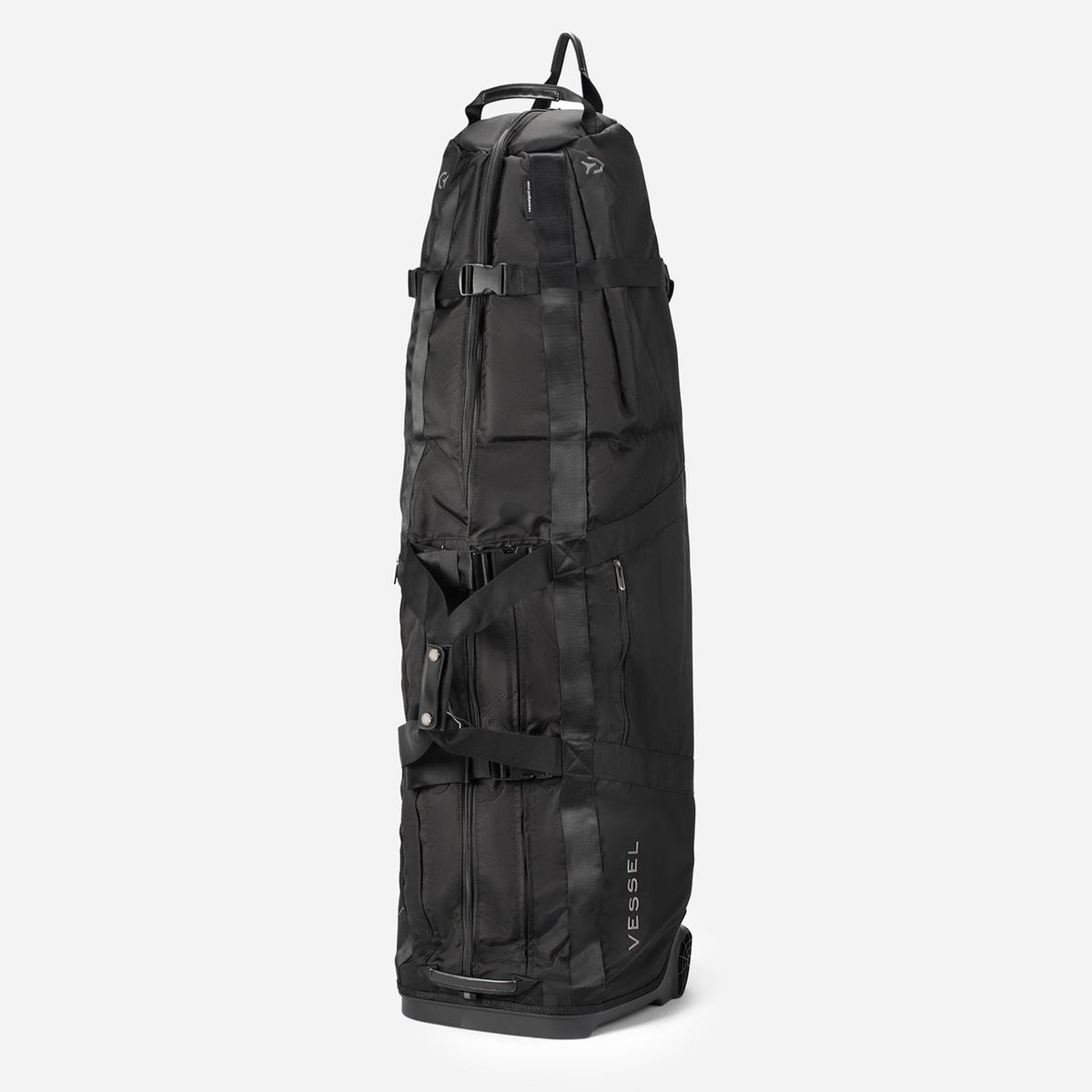 A black golf travel case made from ballistic nylon, with compression straps and a padded top.