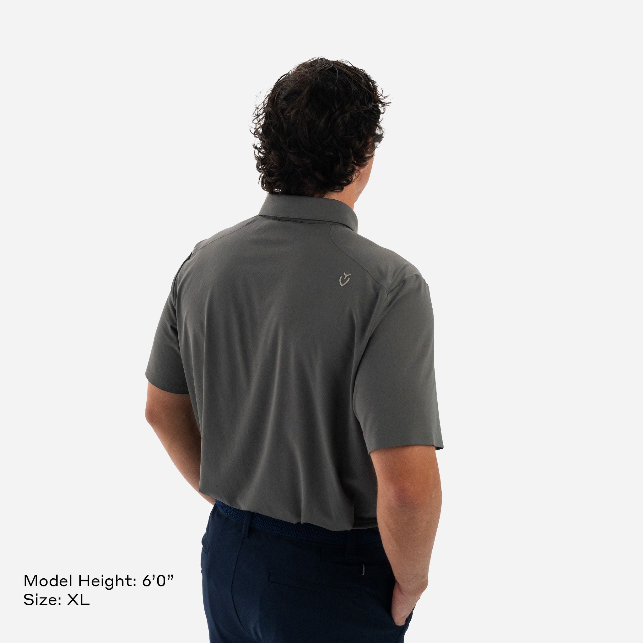 Model is 6'0" wearing size XL Performance Tech Polo Grey backside