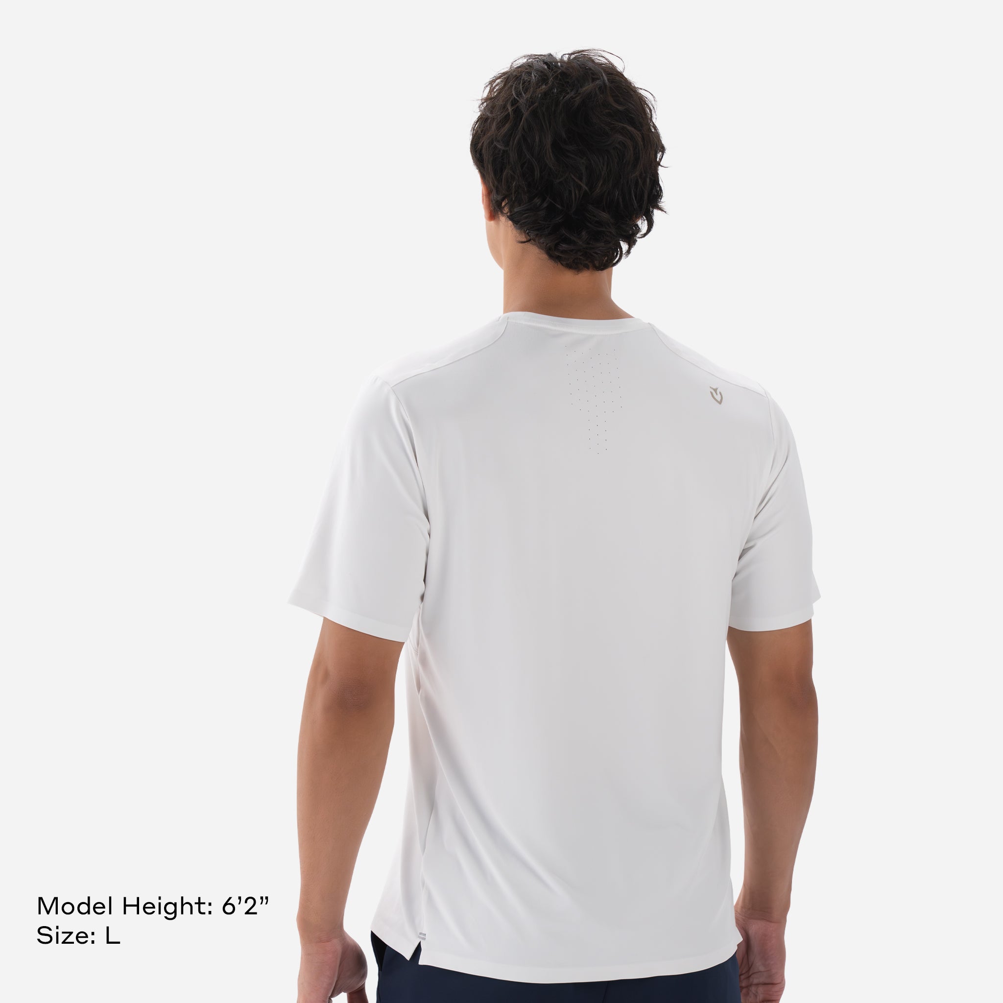 Model is 6'2" Wearing Size L Performance Tech Tee White backside