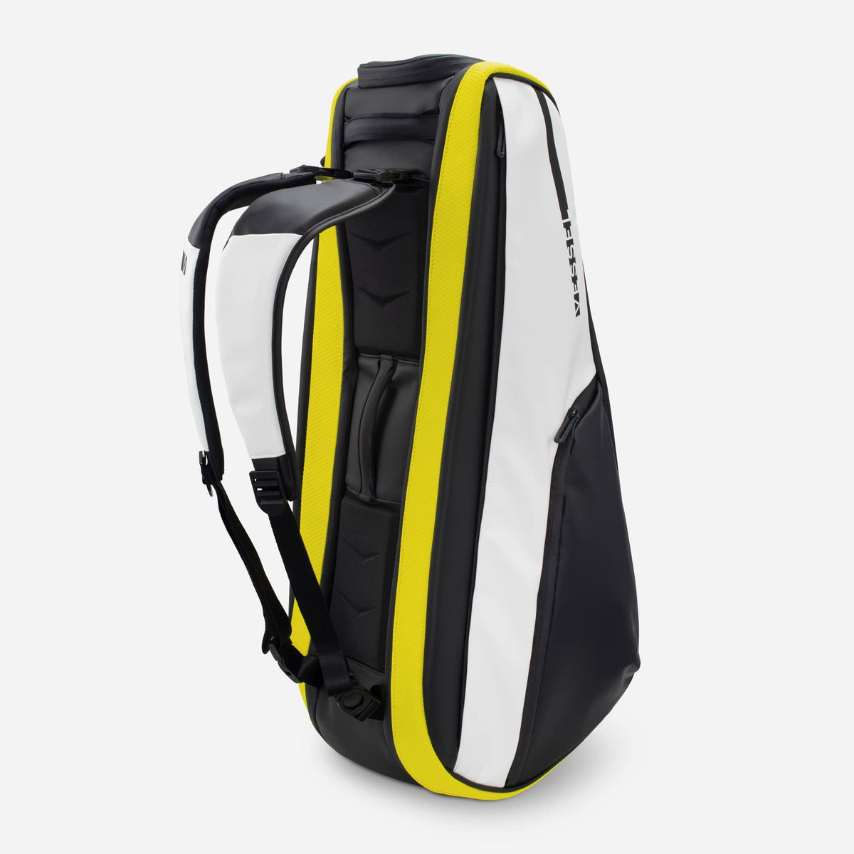 Baseline Racquet Bag standing up with backpack straps attached #color_citrine